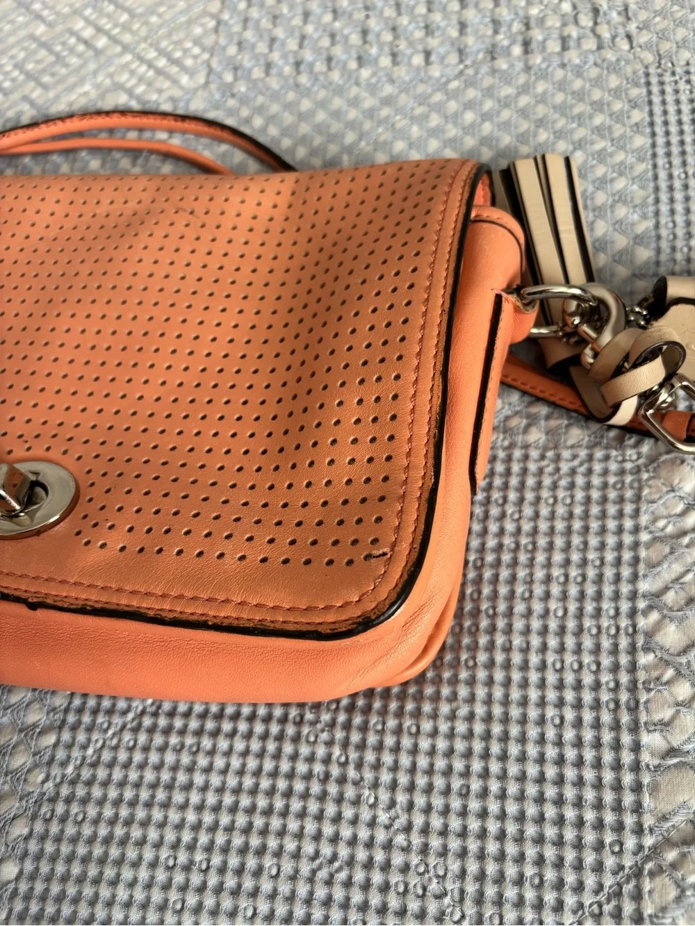 Coach Peach/Coral Perforated Leather Crossbody Bag